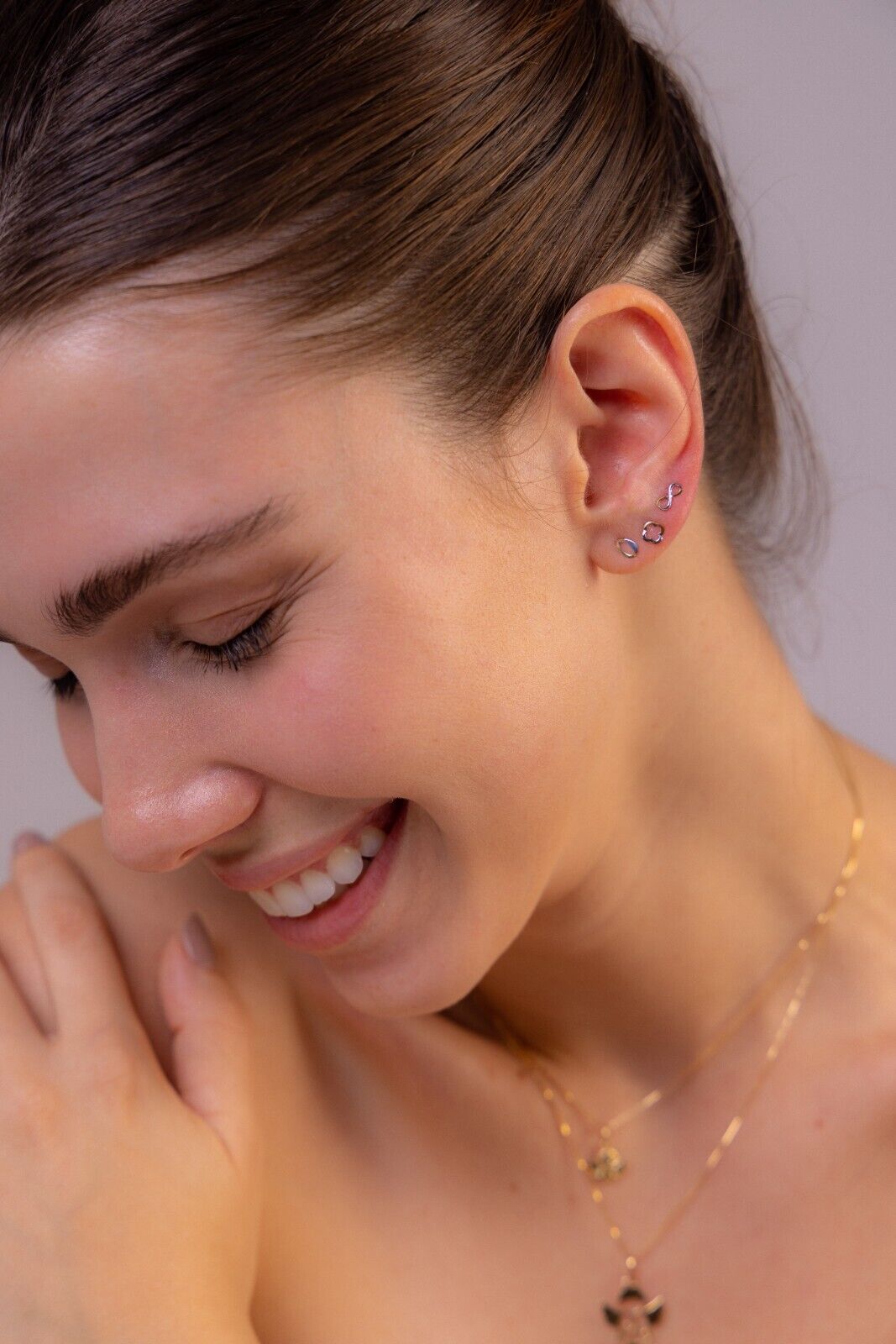 18 K Yellow Gold with Rhodium Infinity earrings for women, girls and kids.